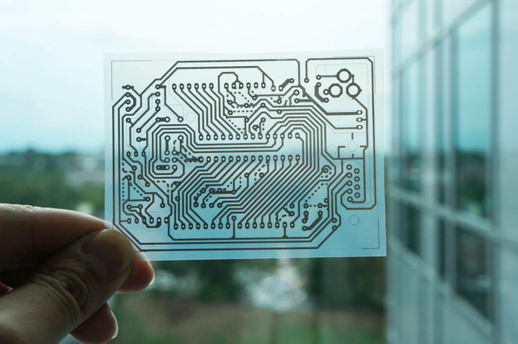 Inkjet-based Circuit - A single-sided wiring pattern for an Arduino micro controller was printed on a transparent sheet of coated PET film.
